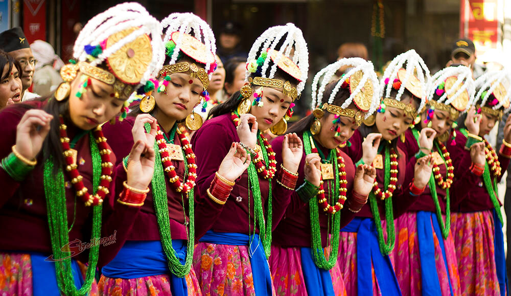 Young Gurung girls perform traditional dance in their traditional attire.