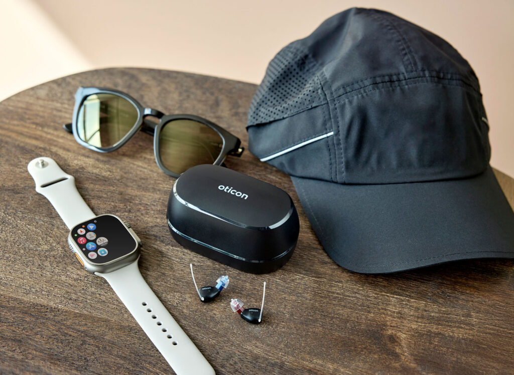 oticon zeal lifestyle charing case hearing aids by Apple watch glasses hat
