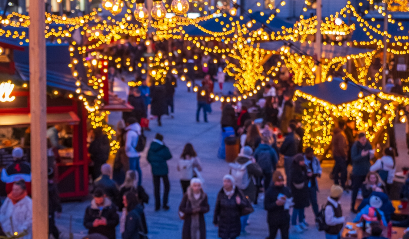 lights shining during holiday outdoor market
