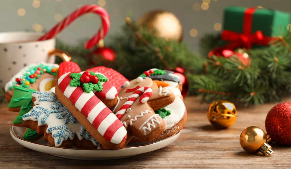 events baking plate full of decorated christmas cookies surrounded by decorations