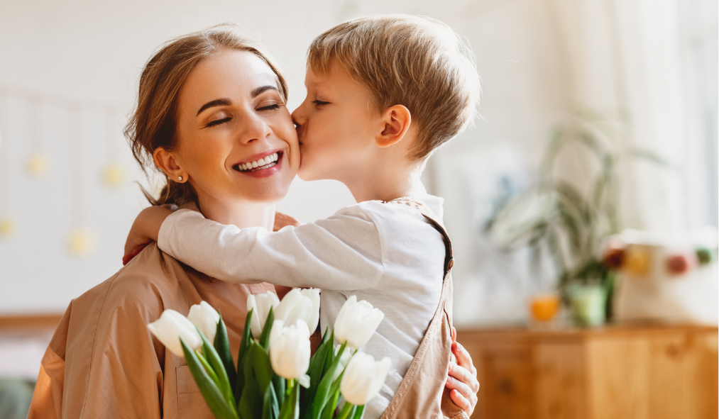 mothers day white son celebrating mothers day kissing cheek