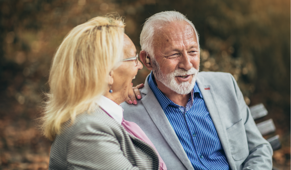 older couple laughing outside