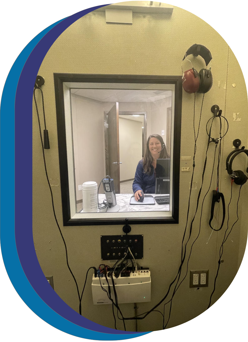 dr rachel performing hearing examination