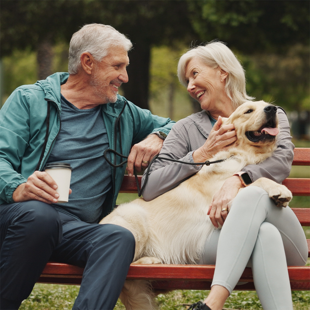 image couple on bench with dog
