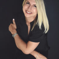 Danette Sitting Arms Crossed 2025