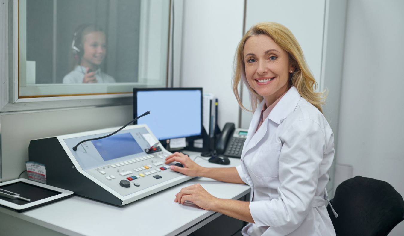 child hearing test with specialist