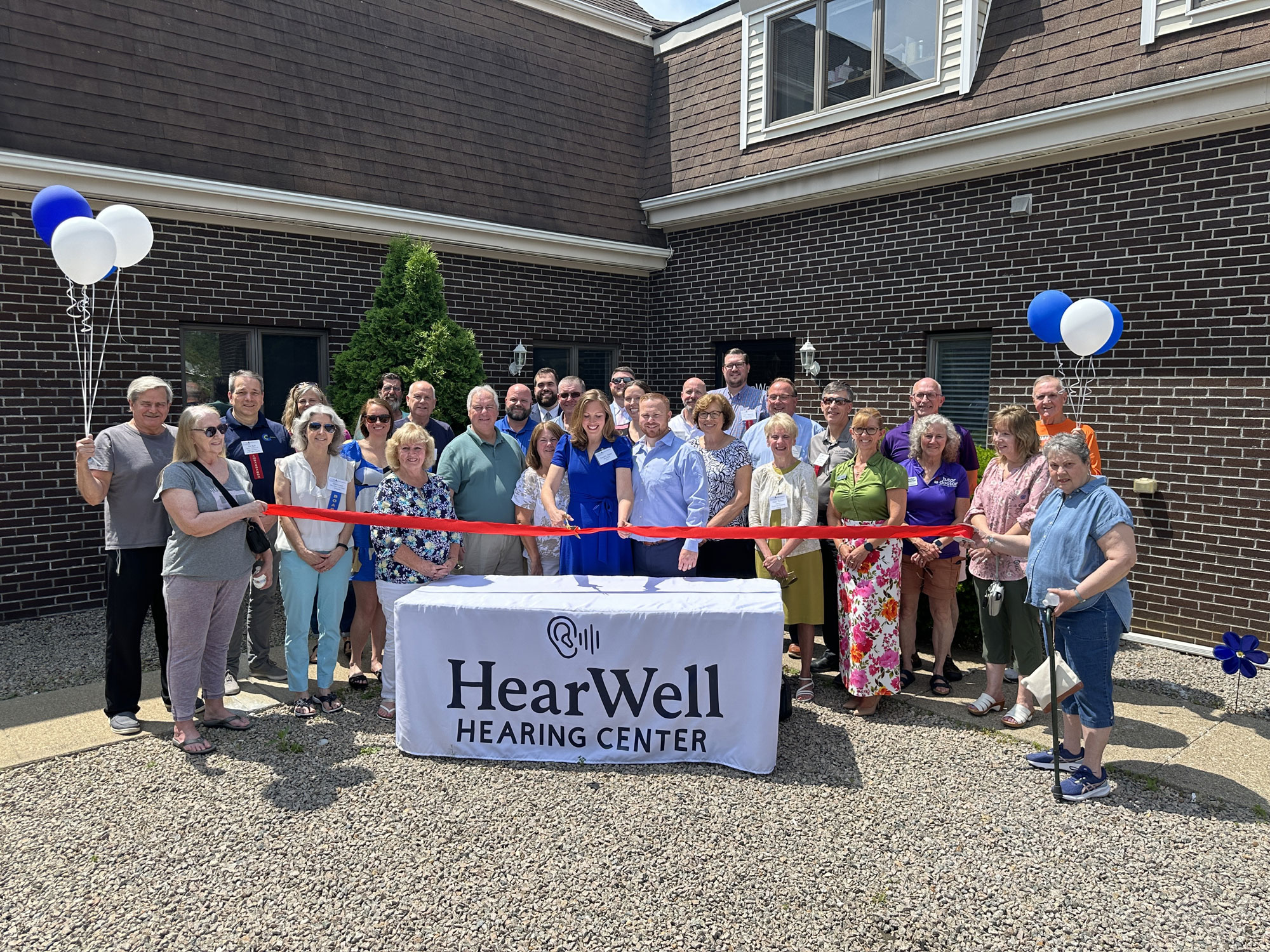 ribbon cutting ceremony for hearwell
