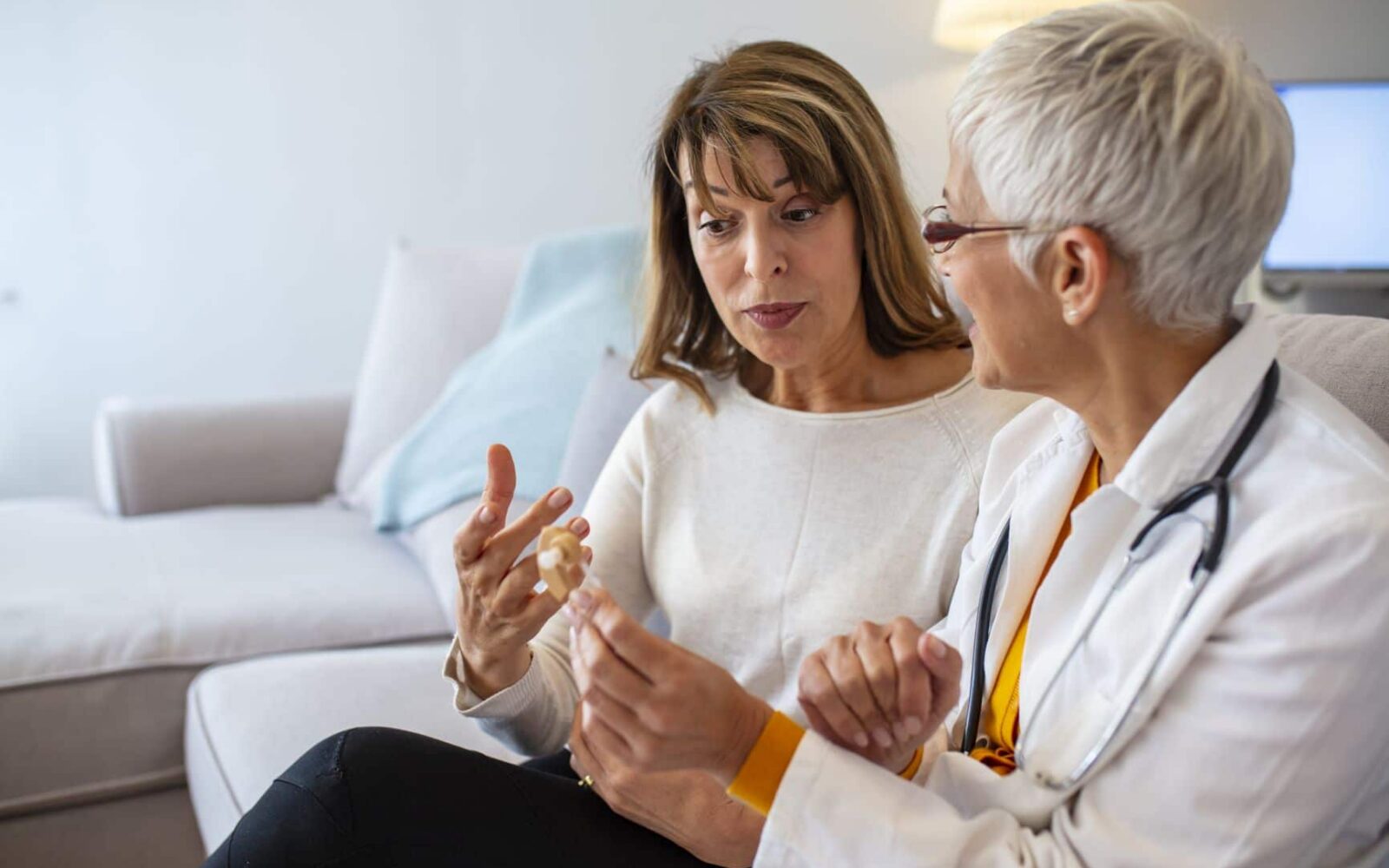 Audiologist explaining results