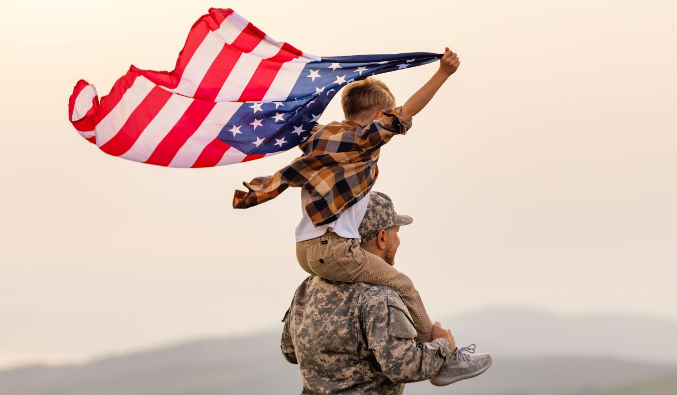 memorial day father veteran son waving american flags