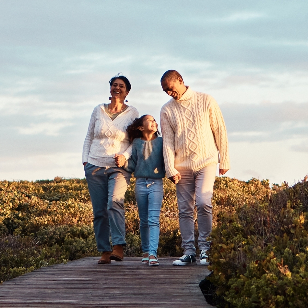 family walking on pier
