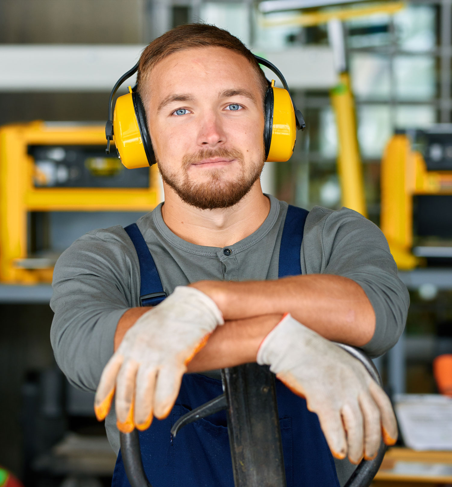 worker wearing protective headphones