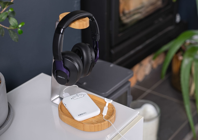 lenire device with headphones