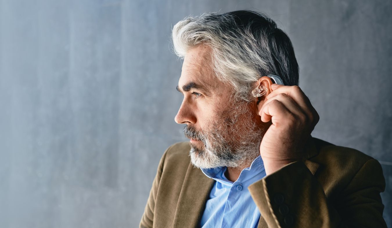 businessman hearing aids