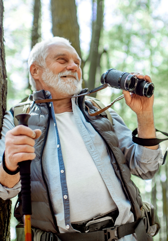 senior man bird watching
