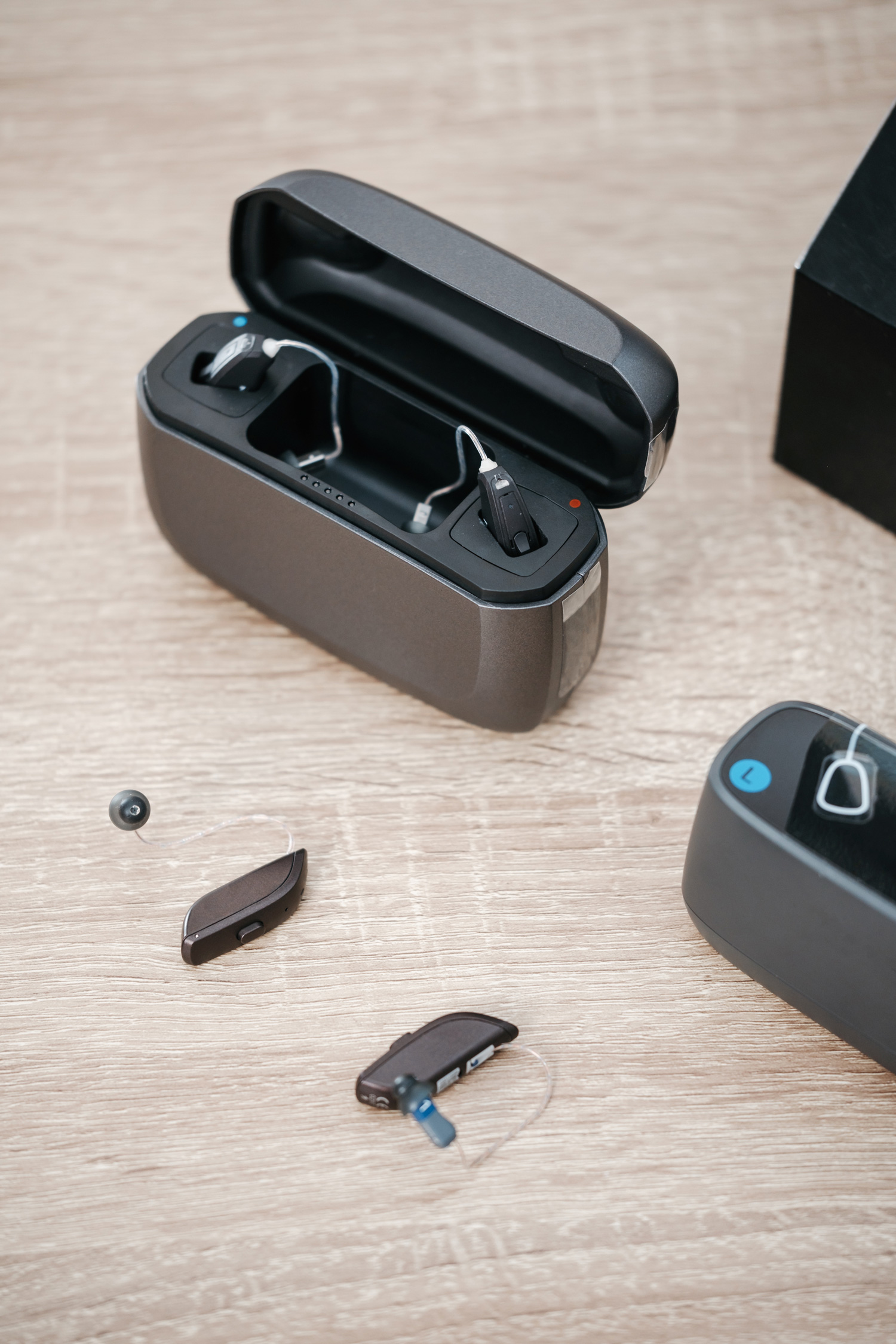 modern digital hearing aids with charging case