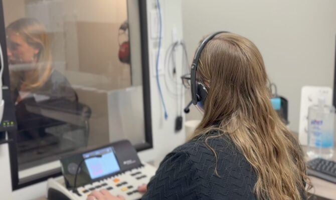 cta stacked provider performing hearing test