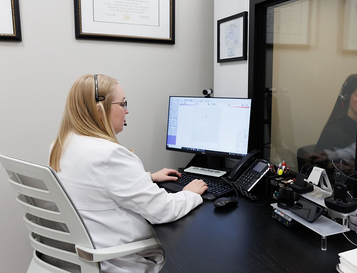 provider performing comprehensive hearing assessments