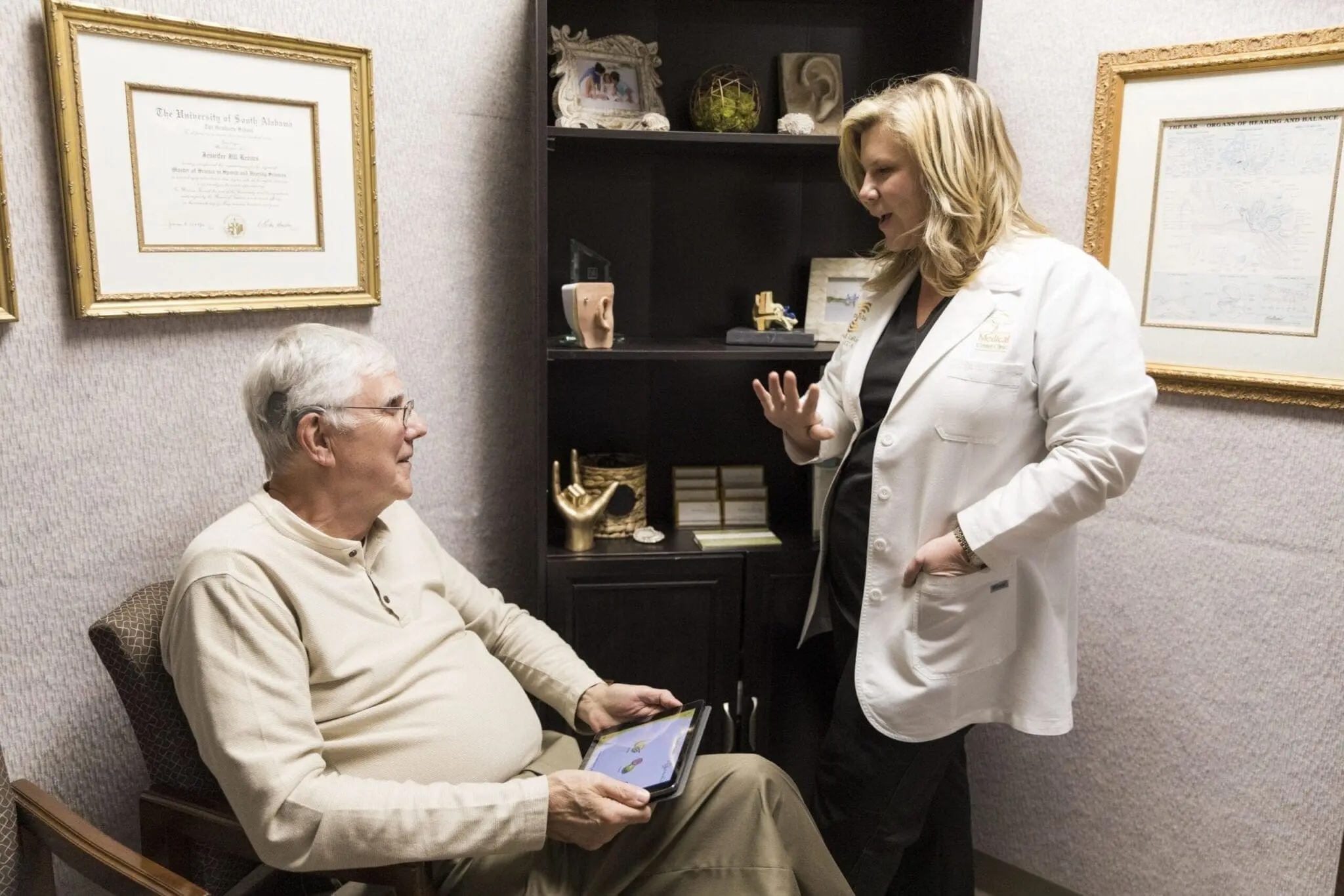 provider discussing cochelar implants with patient