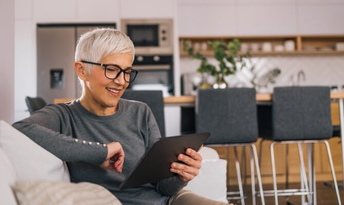 cta stacked senior woman using tablet
