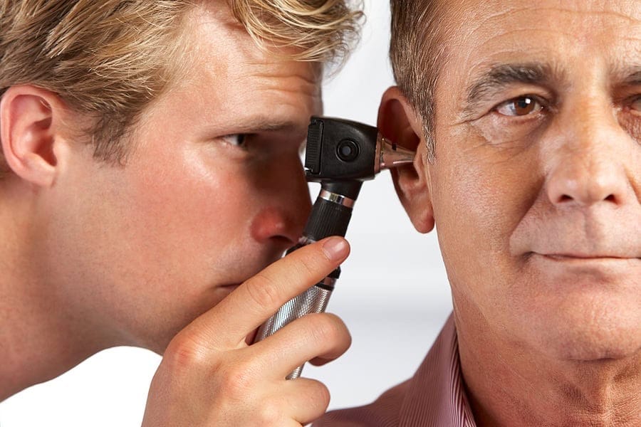 bigstock Doctor Examining Male Patient 41641123