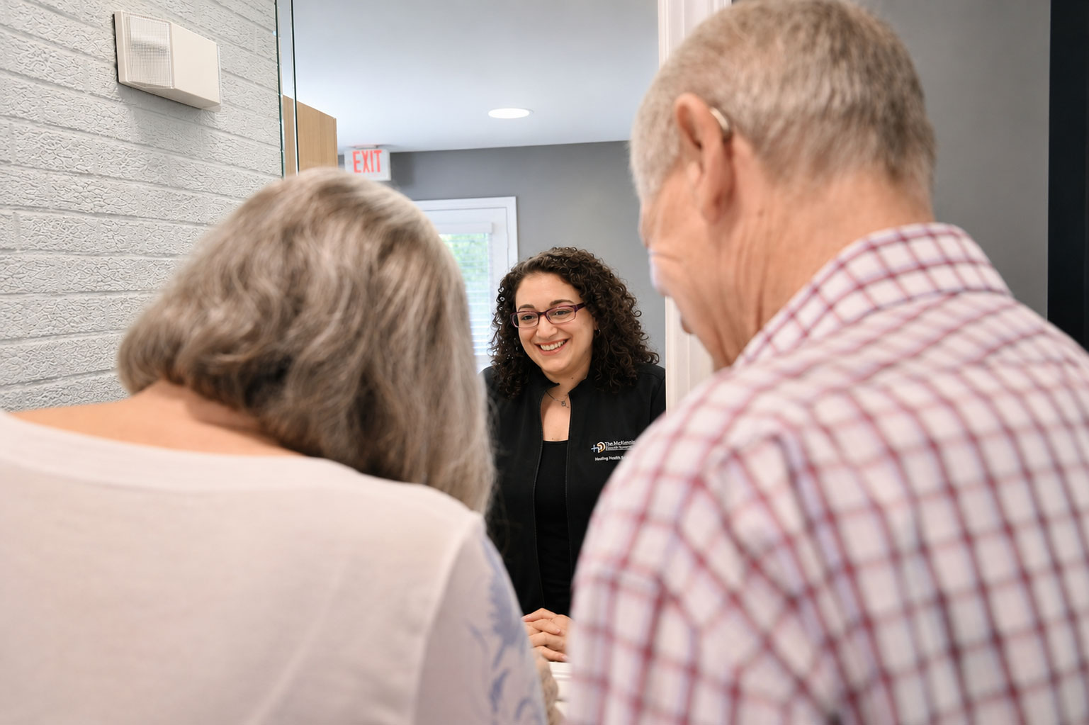 mcguire hearing center front office greeting patients