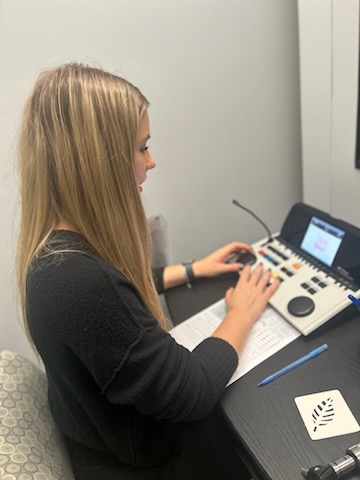 maddie performing hearing evaluation