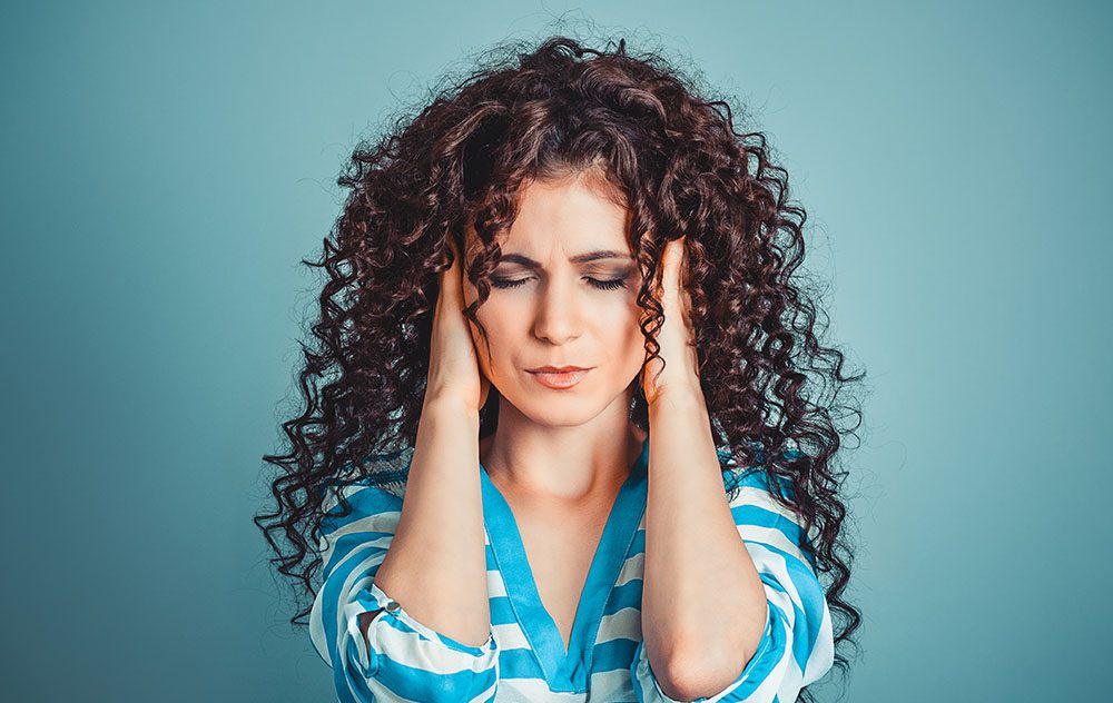 woman with minor head or ear pains