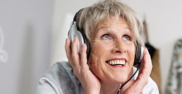 woman-headphones-excited