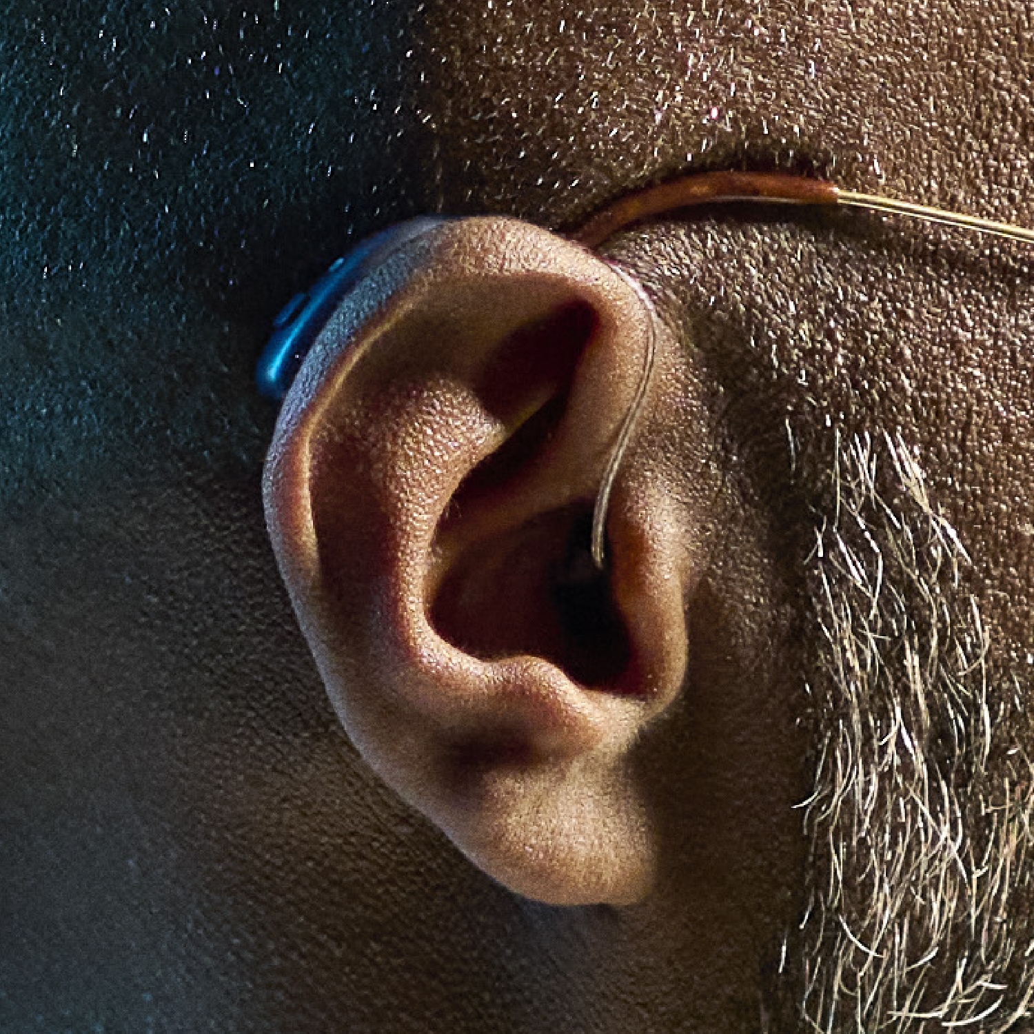 ReSound Vivia bte hearing aid closeup older black male