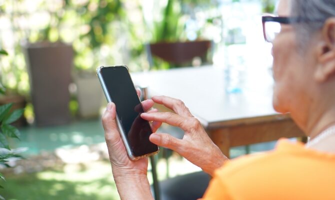 cta stacked senior woman using cell phone to make call