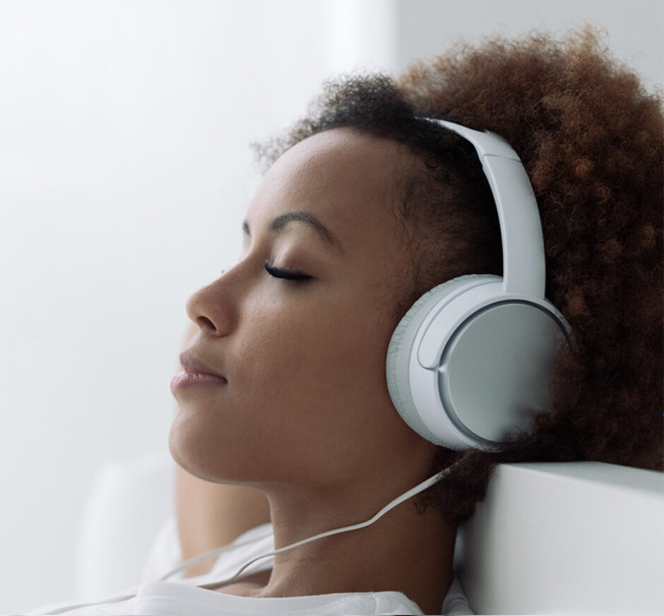 person using headphones