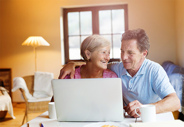 Elderly Couple on Laptop