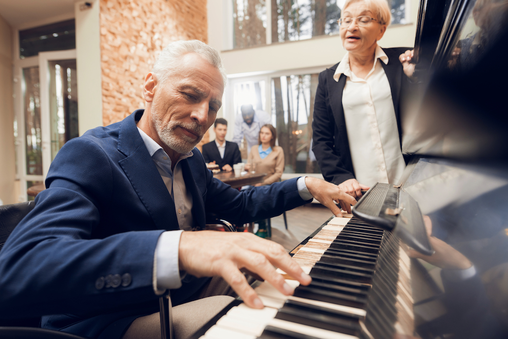 older pianist performing at restaurant