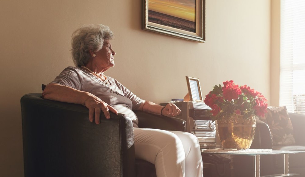 tinnitus senior woman sitting