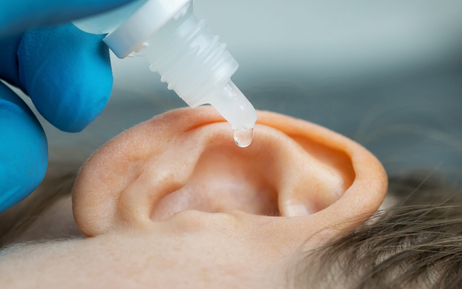 Learn how to identify earwax blockage symptoms and discover safe, effective ways to find relief without risking your hearing.