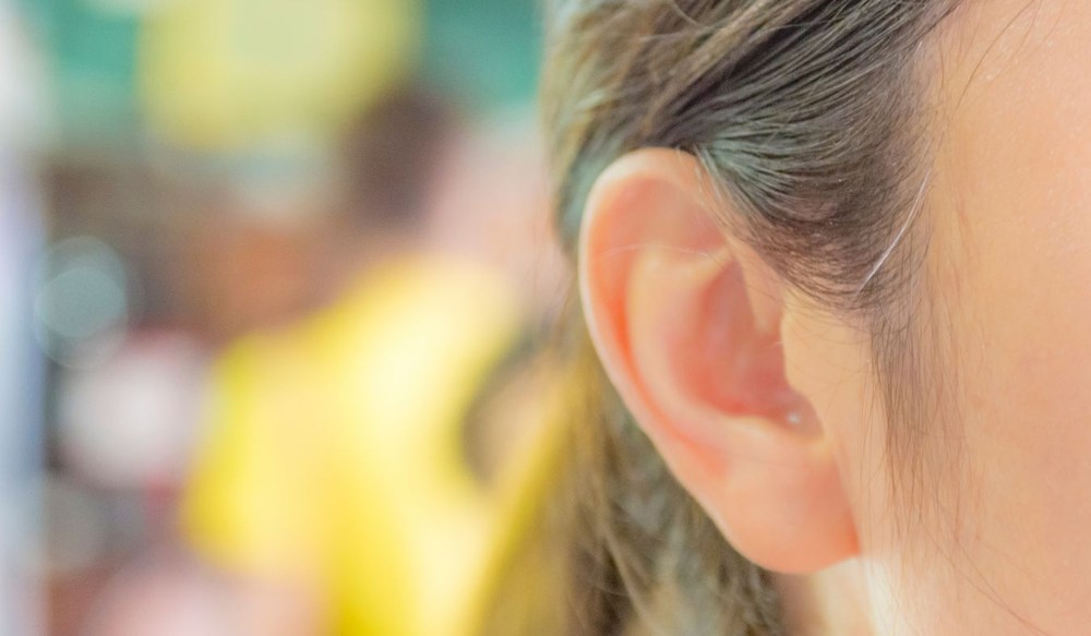 ears female profile blur