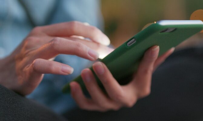 cta stacked person using tablet side view closeup