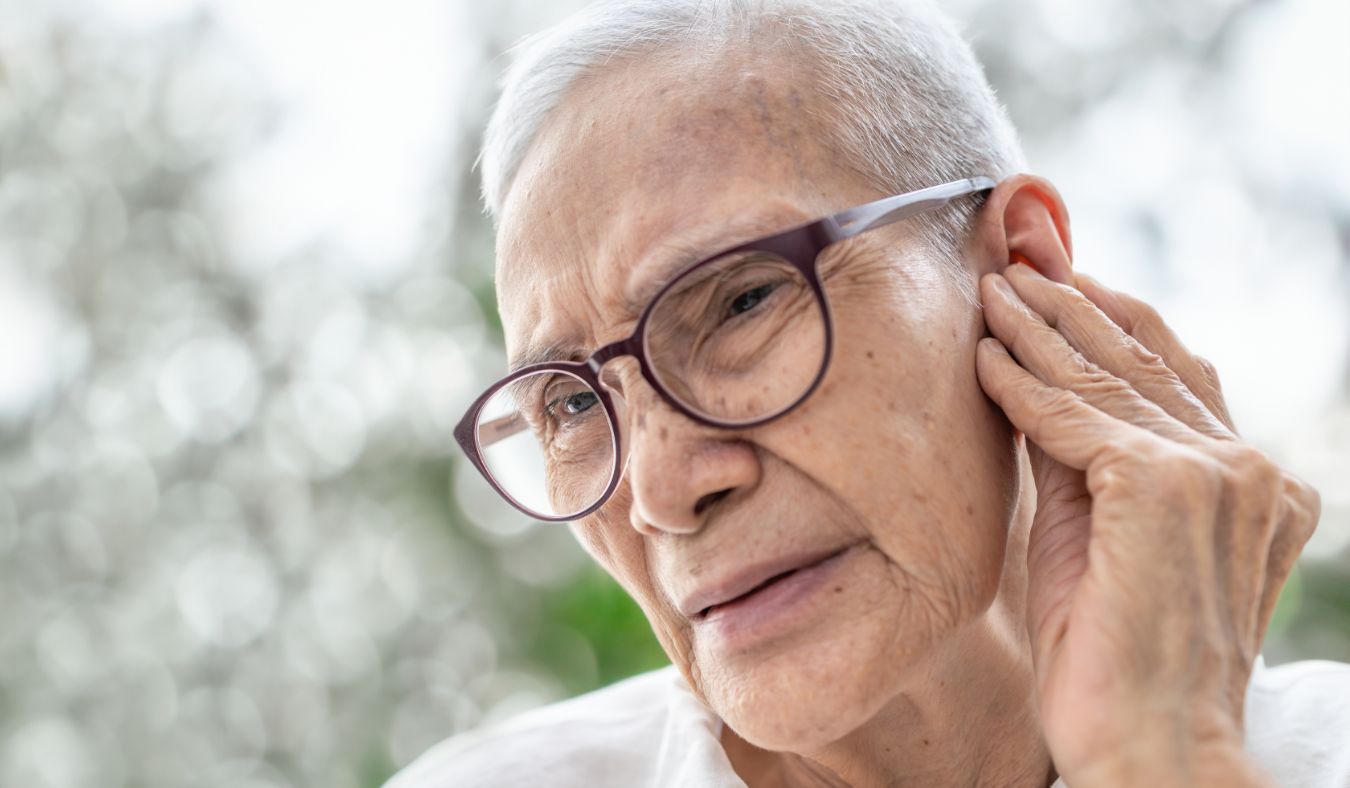 ear health pain asian man