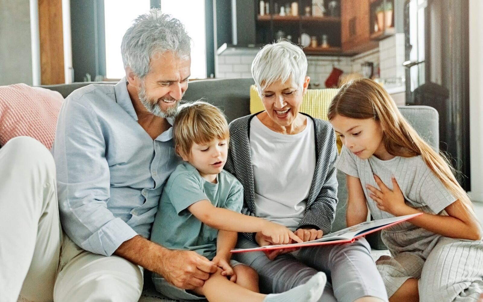 happy grandparents reading