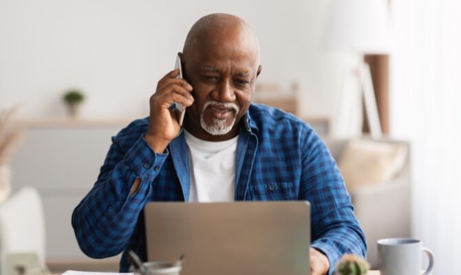 cta stacked senior man talking on phone using laptop