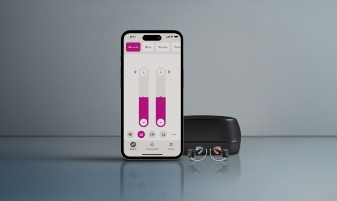 cta stacked oticon zeal product with charger and iphone