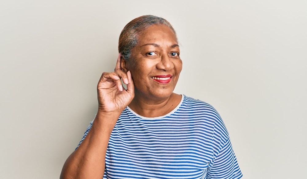 ears mature african american woman hearing