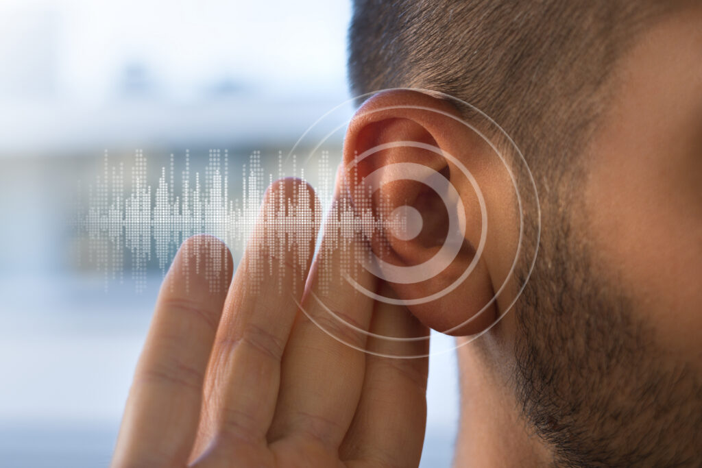 Young man with hearing problems or hearing loss Hearing test concept