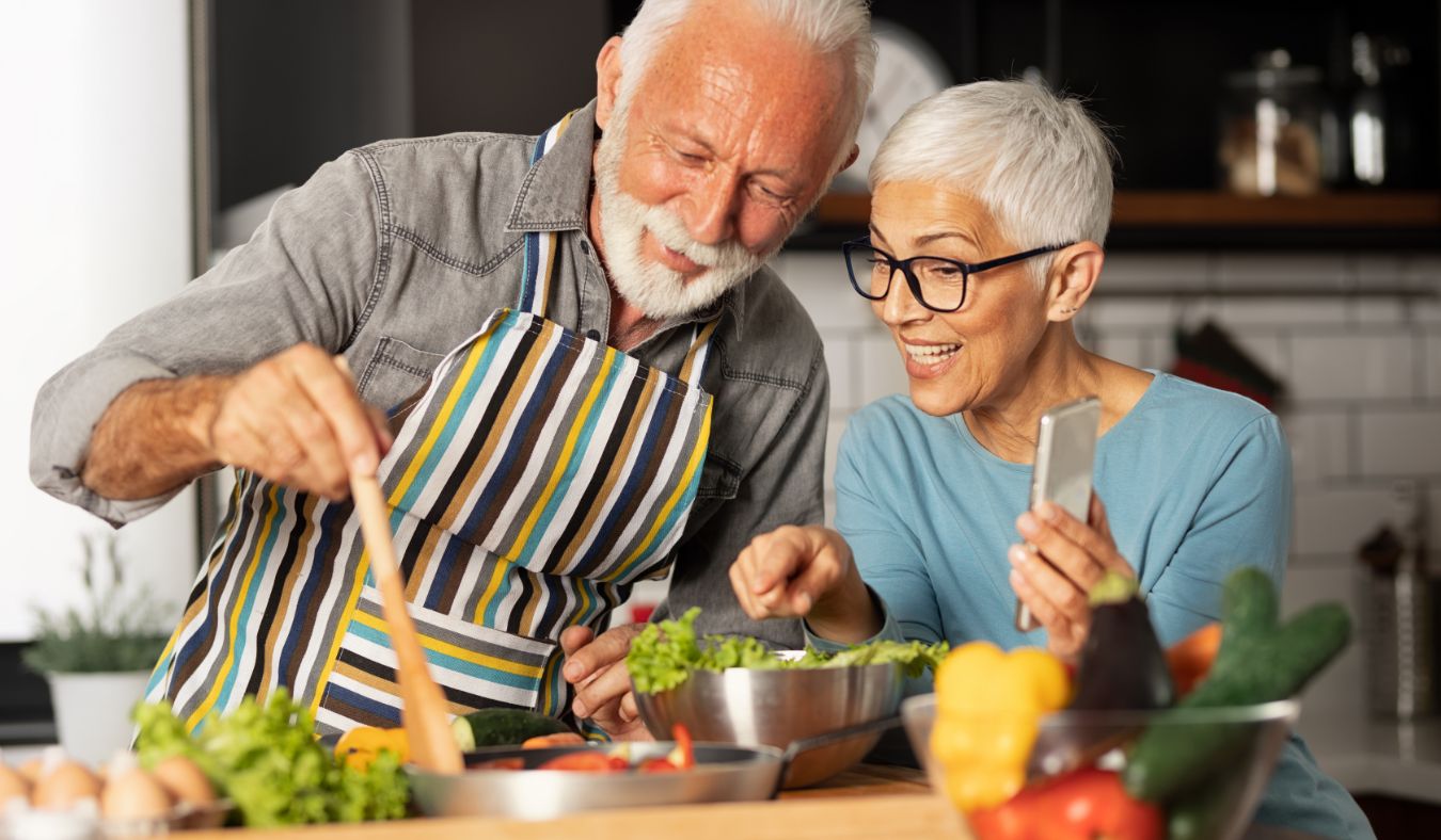 senior couple cooking