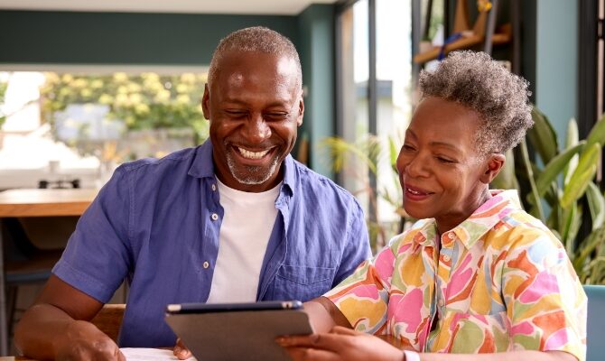 cta stacked senior couple using tablet