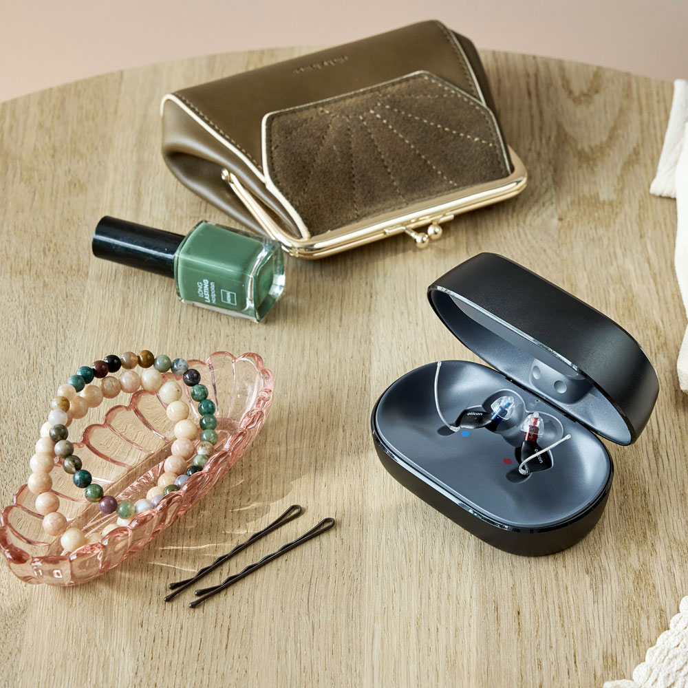 oticon zeal lifestyle square open charging case by purse contents bracelets