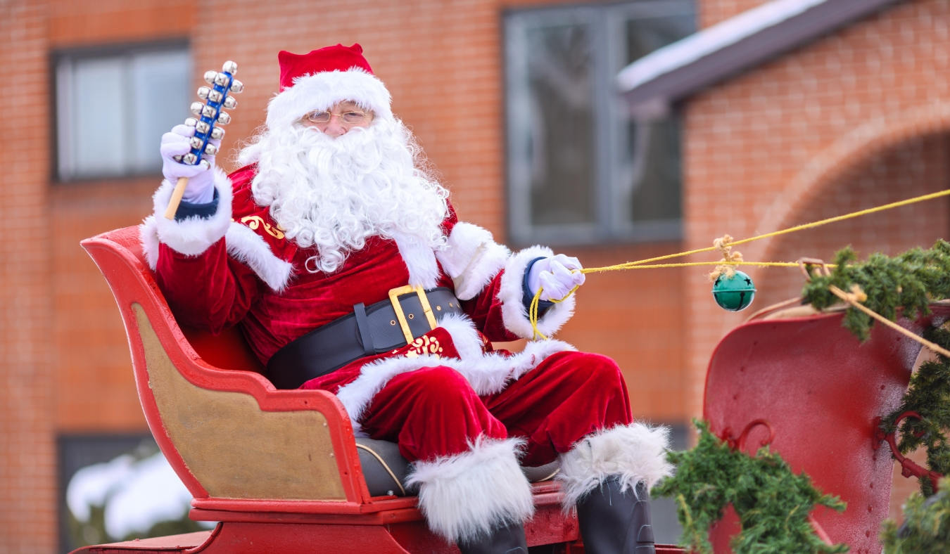santa waving during christmas parade
