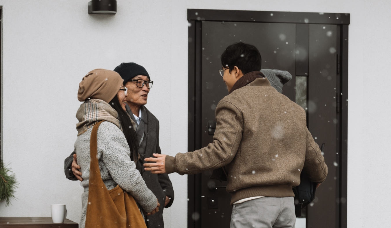 friends greeting each other on a winter day