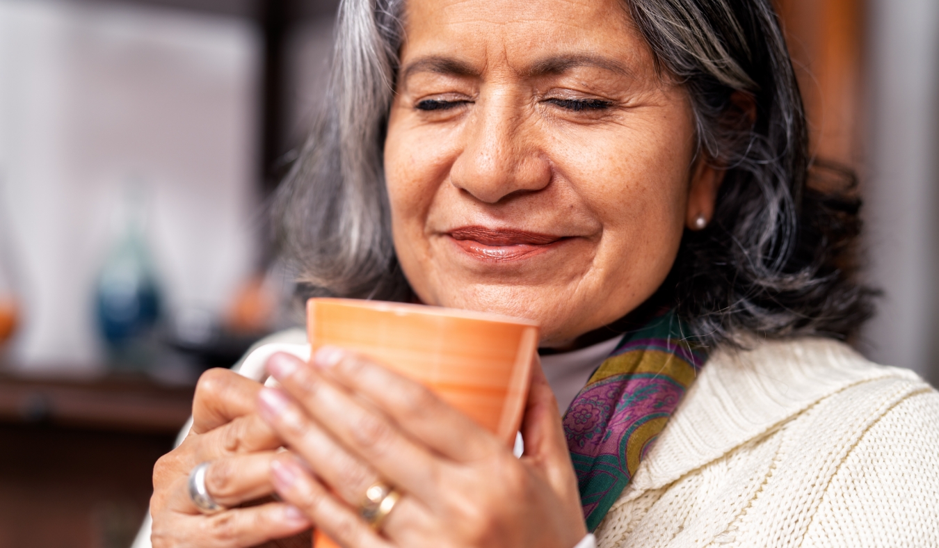 older woman enjoying a nice cup of tea