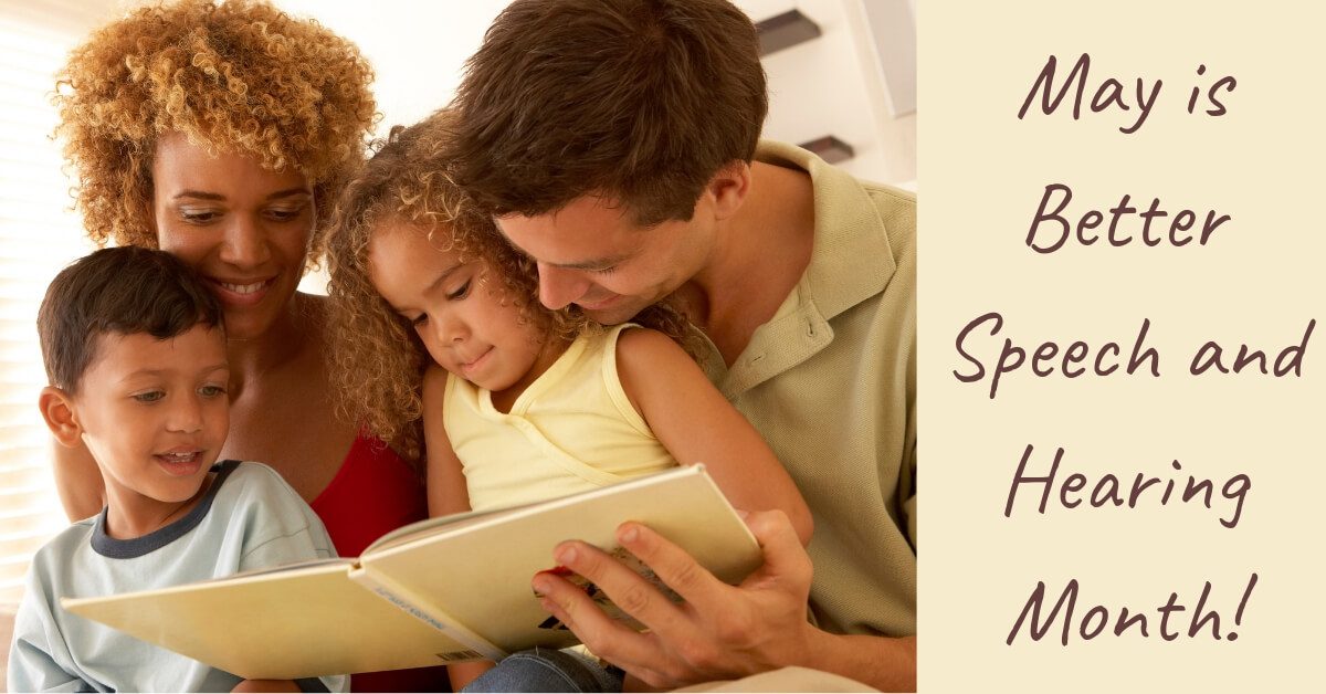 a young family reading a book together